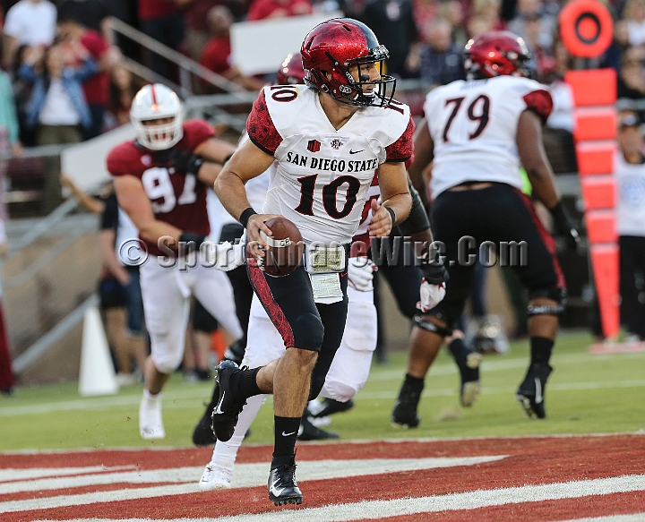 20180831SanDiegoatStanford-07.JPG - San Diego quarterback Christian Chapman (10) rolls out during an NCAA football game against the Stanford Cardinal  in Stanford, Calif. on Friday, August 31, 2017. Stanford defeated San Diego State 31-10. 